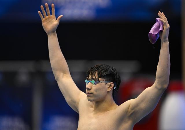 1690377273322019824.jpg 注册观看-世锦赛Day4:覃海洋问鼎50蛙 男女4X100混中国摘金